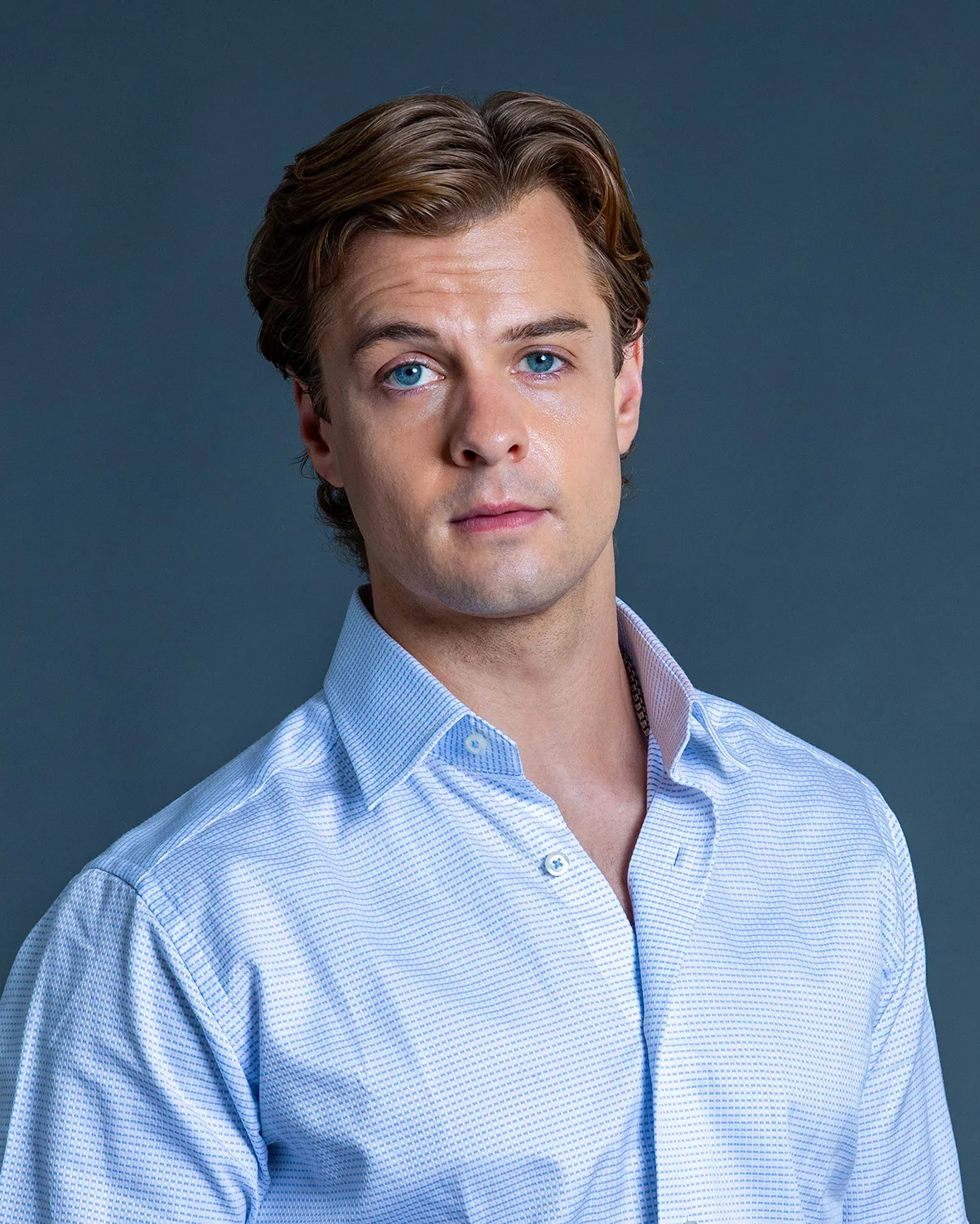 Jake Crossman blue shirt headshot