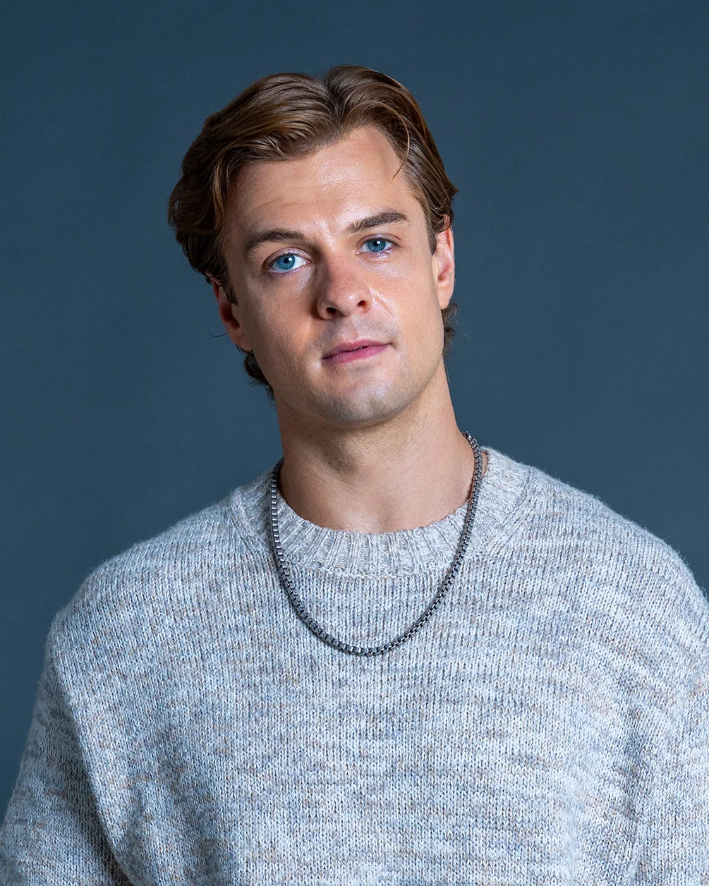 Jake Crossman navy shirt headshot