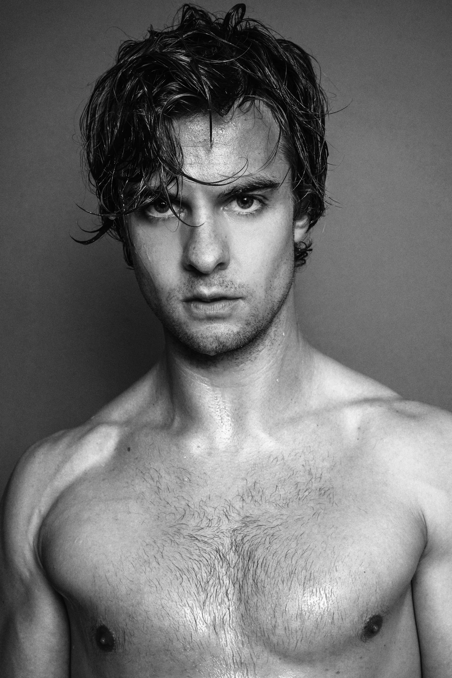Black-and-white close portrait of Jake Crossman